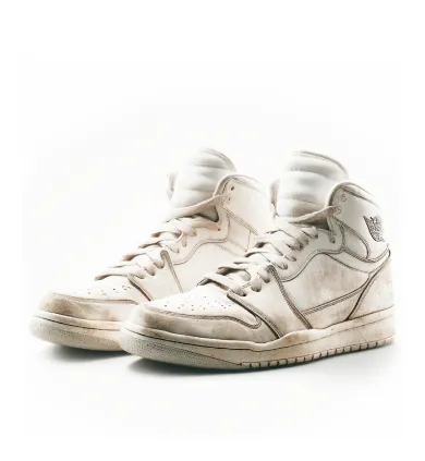 Worn white high-top sneakers